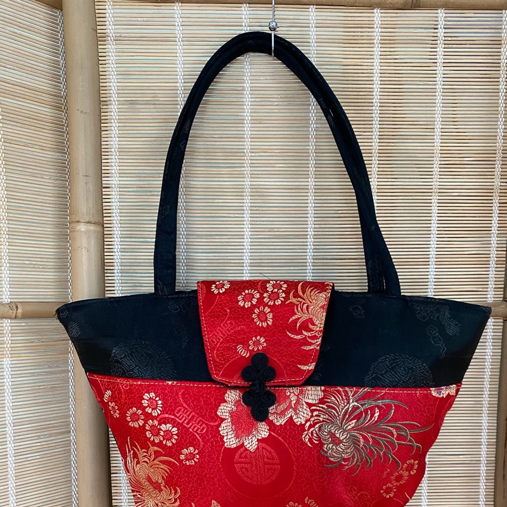 Oriental inspired brocade closure silky handbag